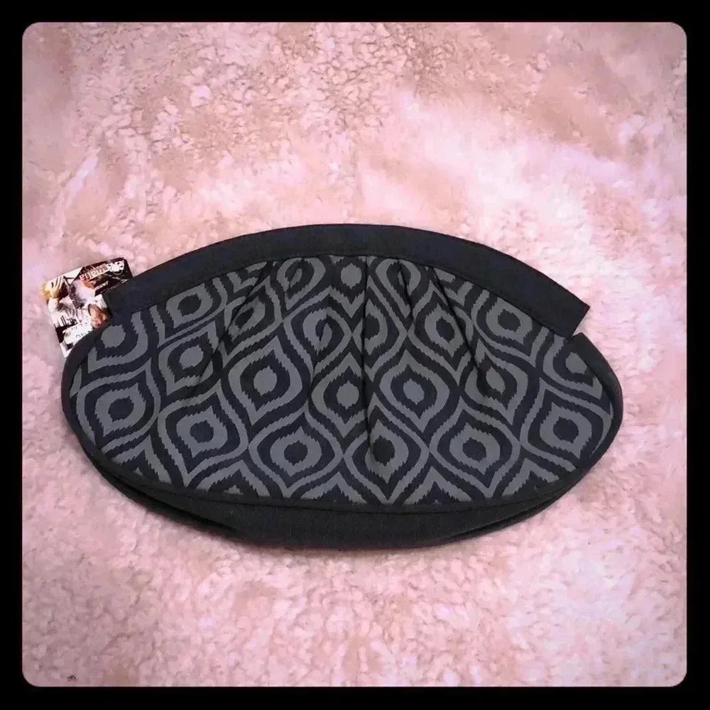 Malia designs cotton clutch.